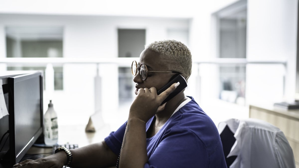 a secretary talking on the telephone