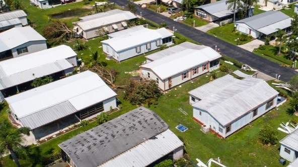 Houses damaged by a storm.