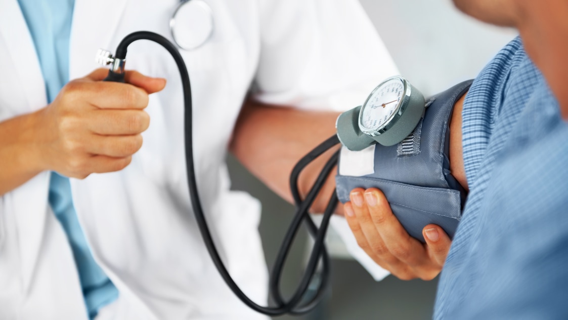 Person getting his blood pressure measured