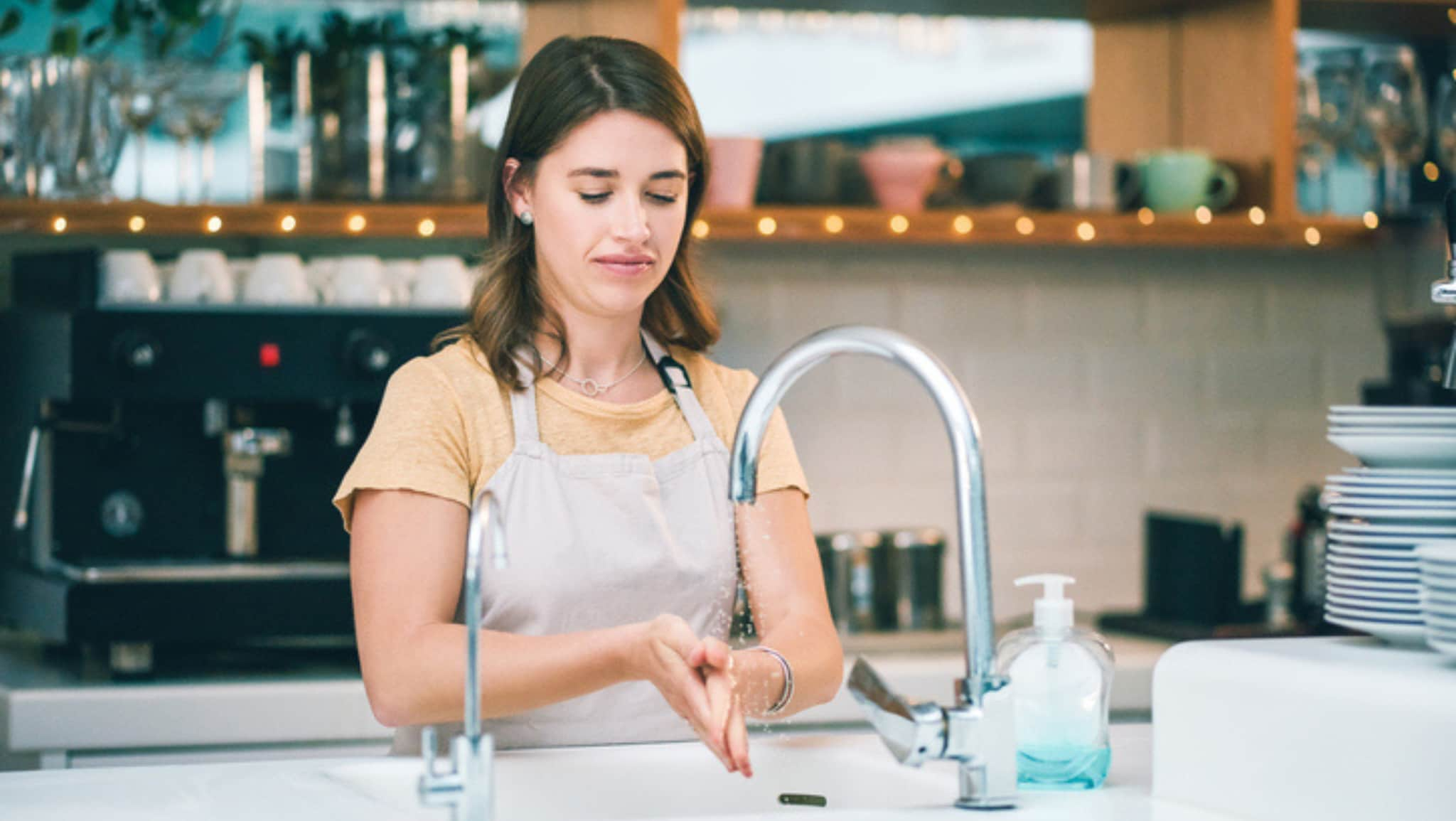 employee washing hands