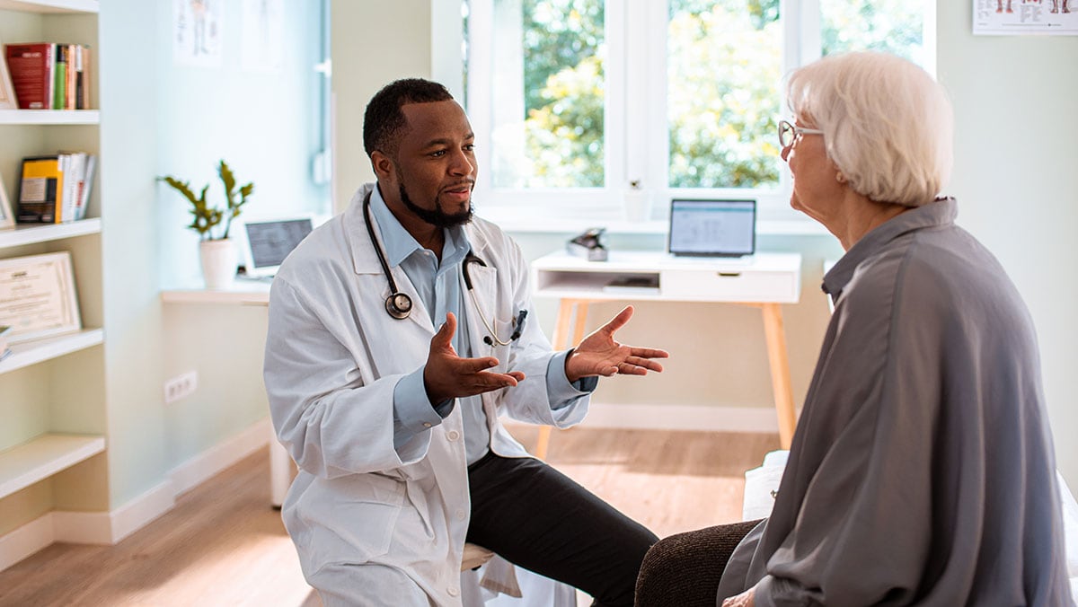 healthcare professional talking to patient