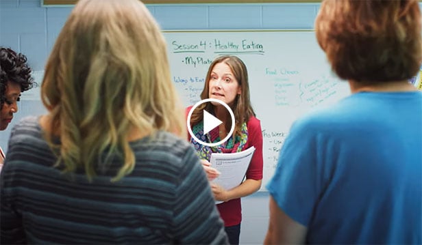 Diabetes coach in front of whiteboard