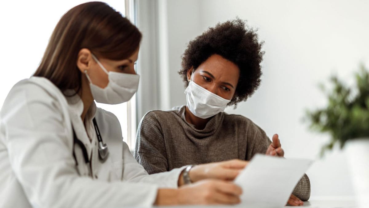 Doctor and patient discussing treatment