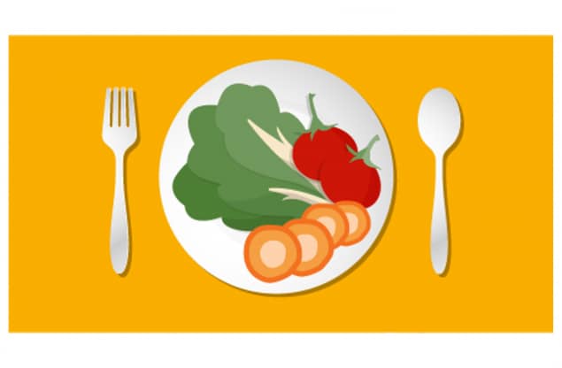 This image shows an illustration of a plate with vegetables and a fork and spoon.