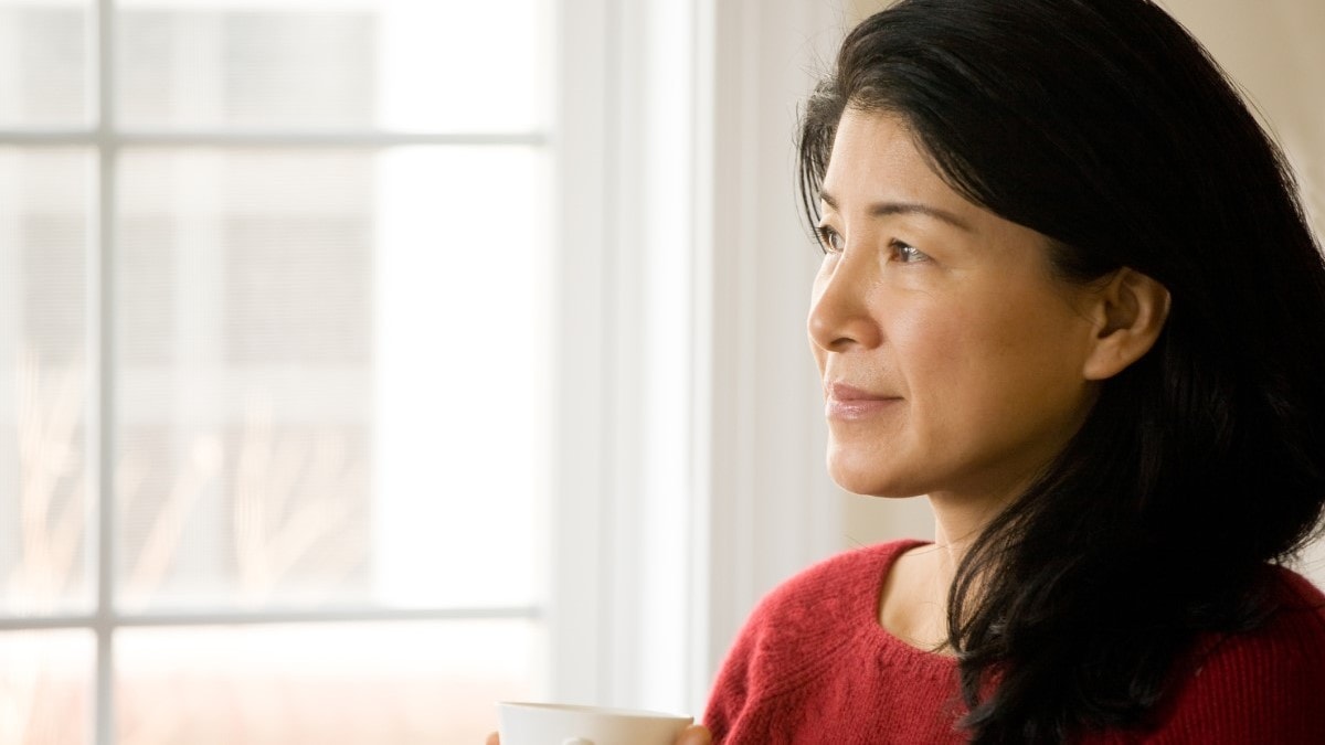 a woman drinking coffee