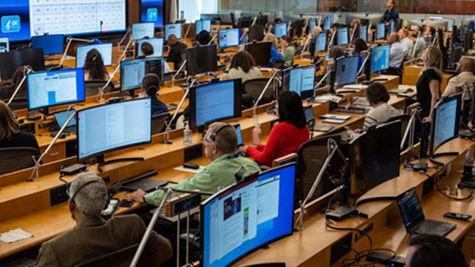 Emergency Operations Center (EOC) full of staff working.