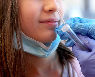 Girl receiving covid test