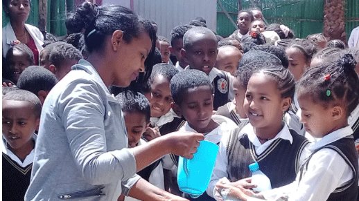 Photo of woman teaching students