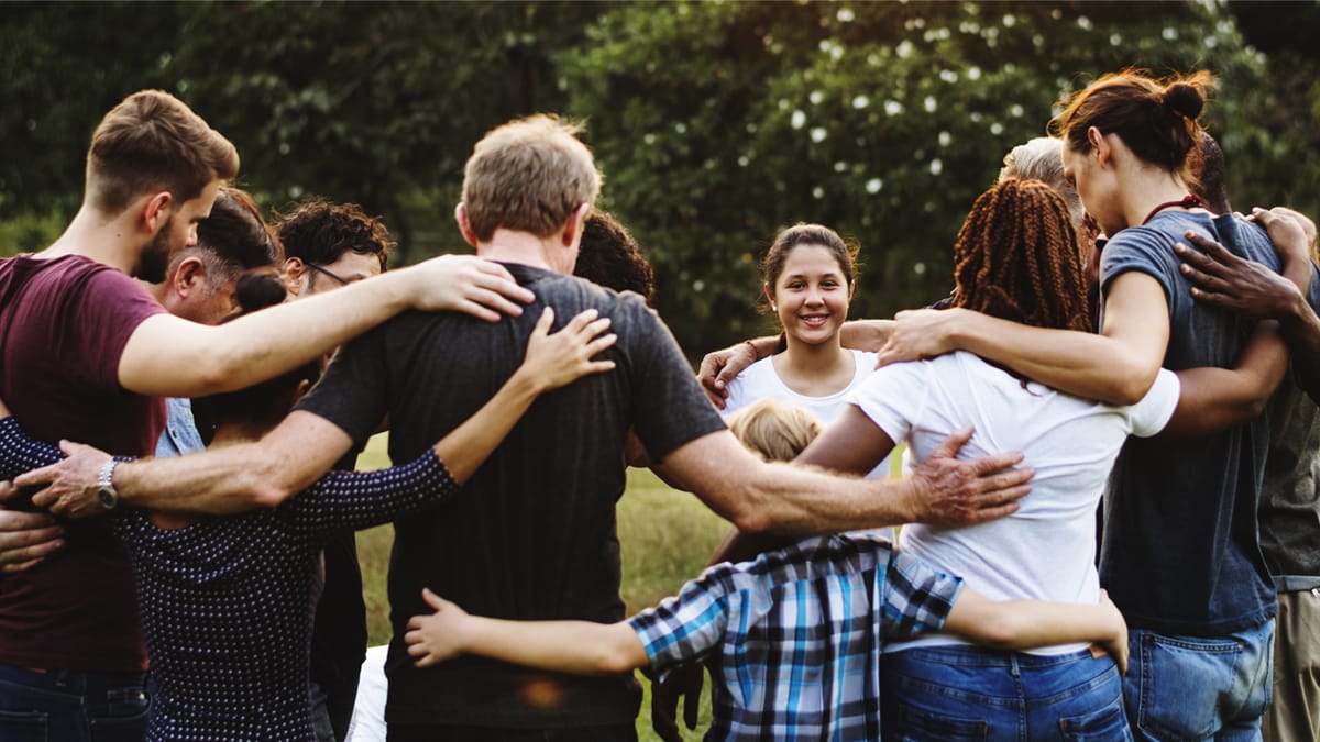 Group of people in circle of support