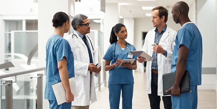 Diverse group of doctors talking