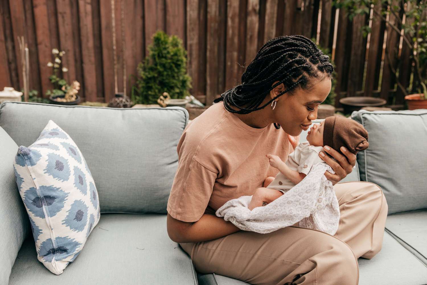 Mother kissing infant