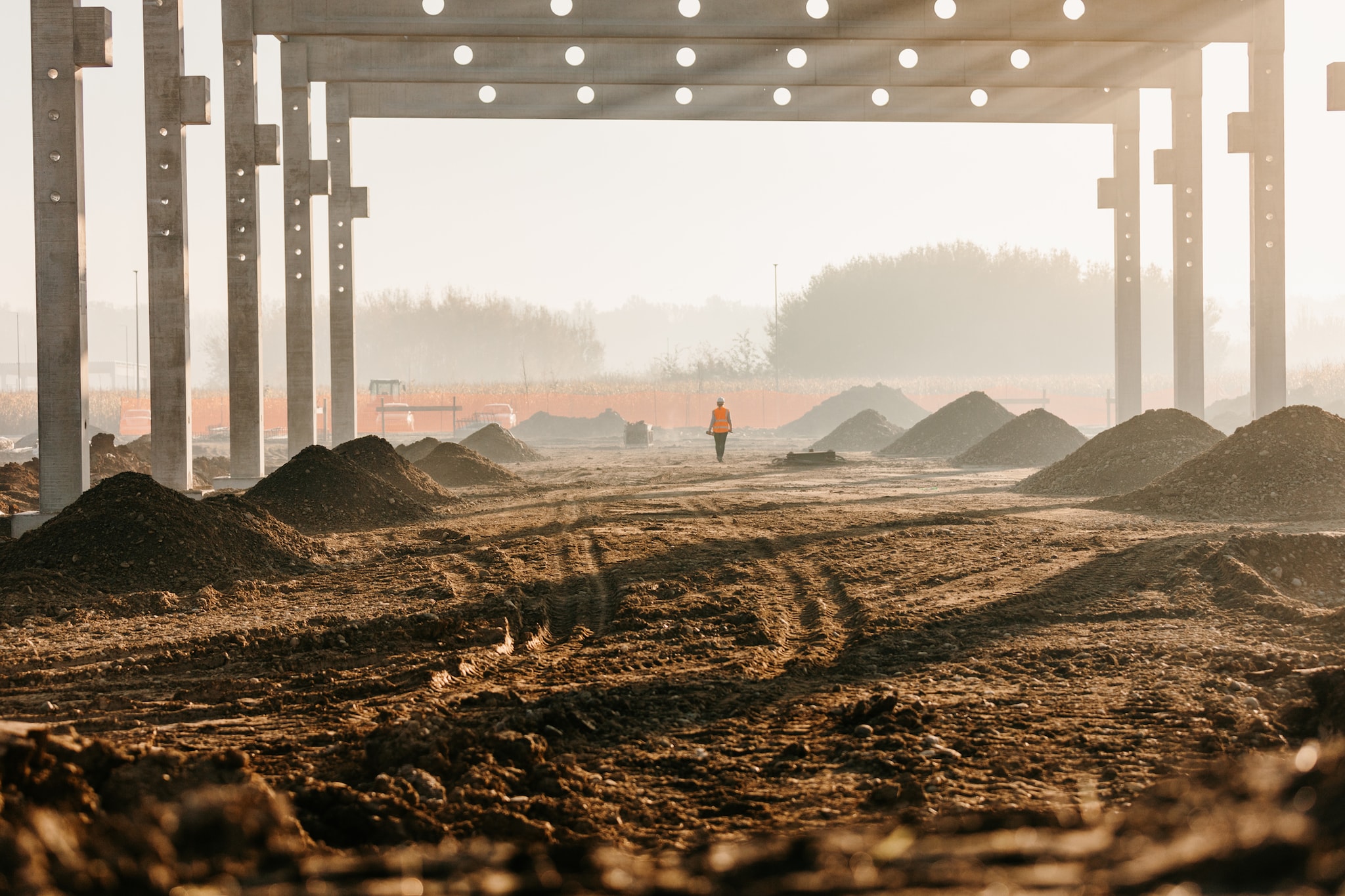 A construction site with dust flying.